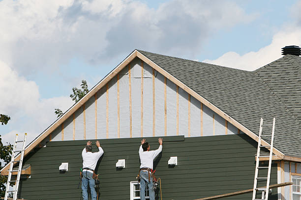 Professional Vinyl Siding technician working in Webster, PA